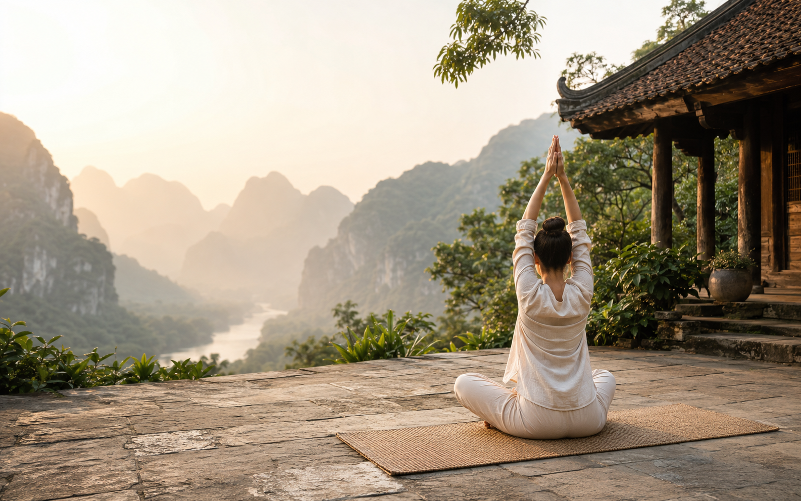 A guest beginning the day with mindful movement in a peaceful destination setting
